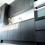 dark wood cabinets and oven