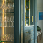 Modern kitchen renovation with bespoke cabinetry, ceramic sink, and Quooker tap by Dovetail Interiors