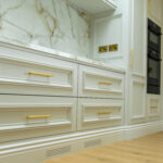 Modern kitchen renovation with bespoke cabinetry, ceramic sink, and Quooker tap by Dovetail Interiors