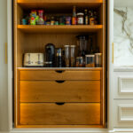 Modern kitchen renovation with bespoke cabinetry, ceramic sink, and Quooker tap by Dovetail Interiors