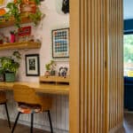 bespoke wall panelling with wooden desk.