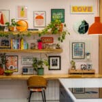 Bespoke desk with floating shelves and wooden chairs