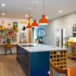 Orange lights, blue island with bora hobs.