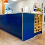 Blue Bespoke Kitchen Island with Wooden wine rack