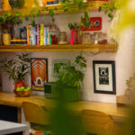 Bespoke wooden desk with matching sears and floating shelves